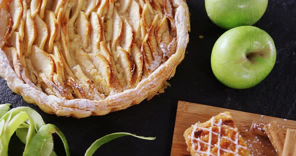 Tart and apple on concrete background 4k