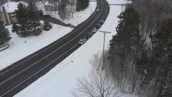 Aerial footage of a freeway in Minnesota during a cloudy winter afternoon