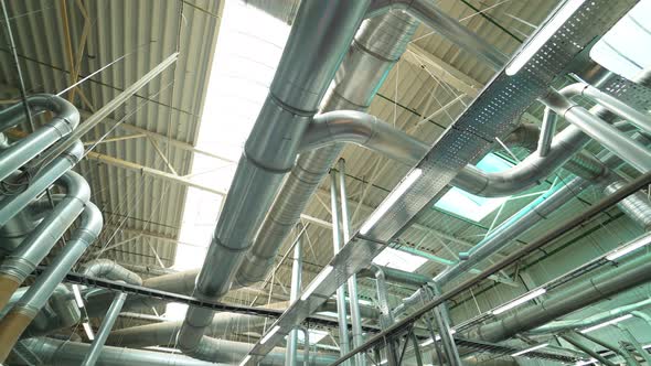 Pipes of the Ventilation System are Located on the Ceiling of Plant 