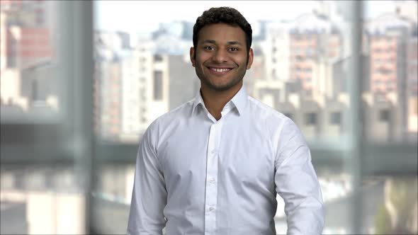 Smiling Indian Man Shows Thumb Up