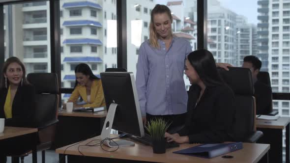 Young Leader Gives Advice to Young Woman Worker