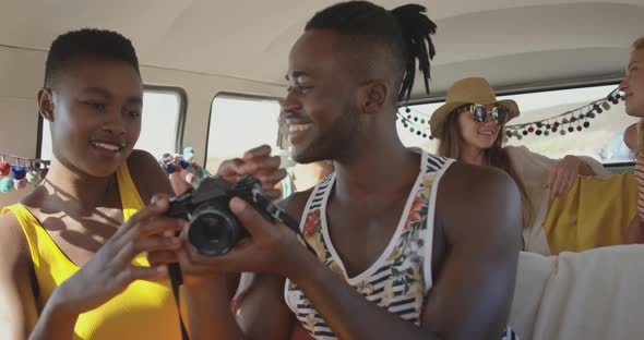 Young adult friends in a camper van 4k