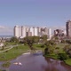 AERIAL VIEW OF PARK AND BUILDINGS IN COASTAL CITY - VideoHive Item for Sale