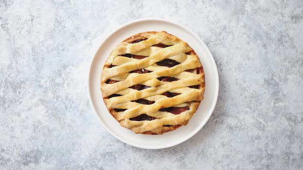 Freshly Baked Homemade Plum Cake Tart Served on White Ceramic Nordic Plate