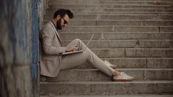 Man Sitting And Typing On Laptop. Businessman Remote Working In Internet Distance Job. Man Freelance