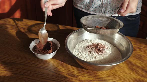 Sifting together the cocoa powder and the flour