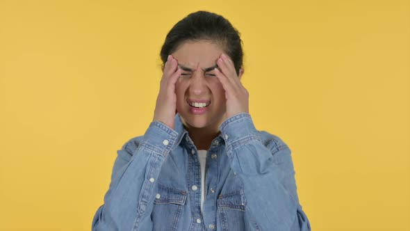 Indian Woman Having Headache Yellow Background