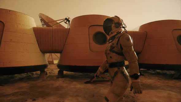 Astronaut on the Planet Mars Making a Detour Around His Base