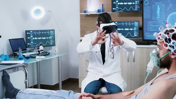 Doctor in a Modern Centre for Brain Analysis Using Vr Headset