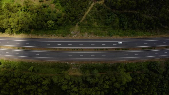 Traffic motion on a highway road in the mountains. 