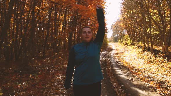 Running Stretching Runner Doing Warmup Before the Marathon Enjoying Autumn Outside