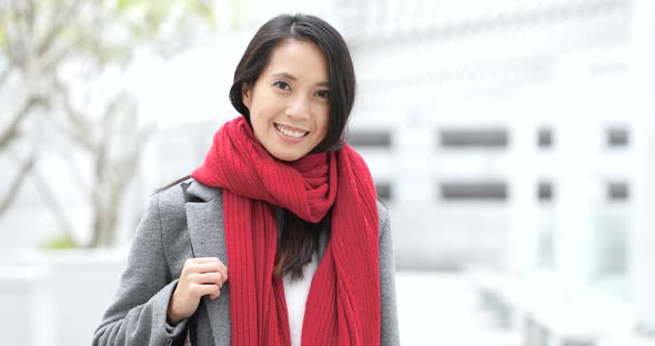 Woman look at mobile phone with shopping bag