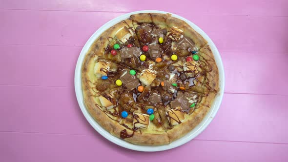 Pizza with Melted Chocolate and Multicolored Candies