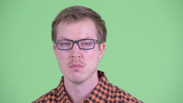 Face of Stressed Young Hipster Man Looking Bored and Tired