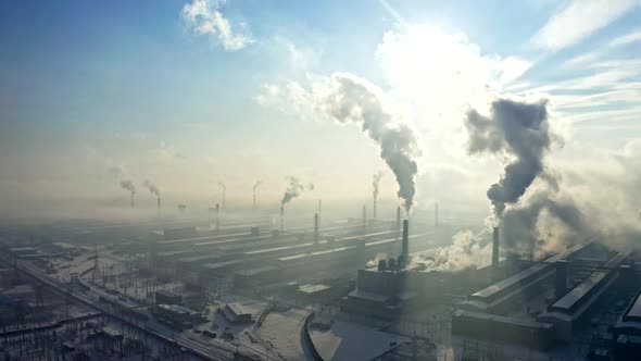 Aerial View of Emissions Into the Atmosphere From the Pipes of the Workshops of the Aluminum Plant