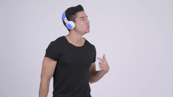 Young Happy Multi-ethnic Man Dancing While Listening To Music