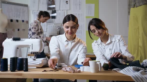 Two Female Fashion Designer Working on the Future Clothes Design