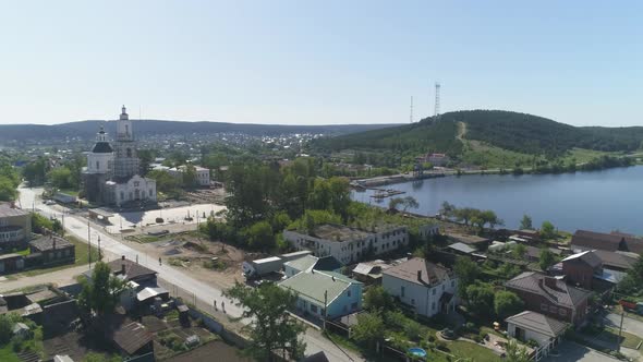 Aerial view of reconstruction of old district with church in provincial city. 06