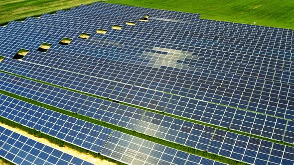 Aerial view of solar panel son green field, view from above, Poland