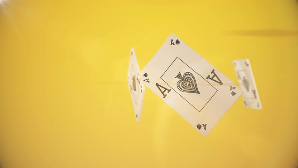 cards rotate among themselves on yellow background
