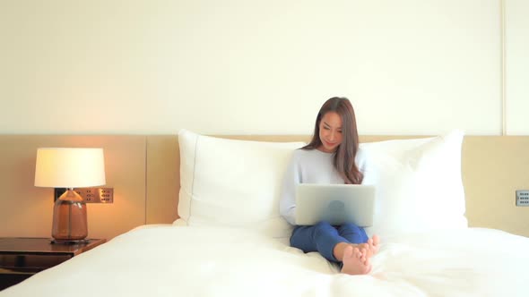 Young asian woman use laptop