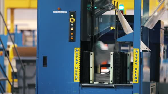 Roll Offset Print Machine in a Large Print Shop for Production of Newspapers. alt