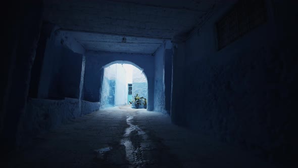 Forwards Reveal of Alleys and Backyards in Blue City of Chefchaouen