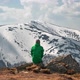Man Sit on Rock in Spring Mountains - VideoHive Item for Sale