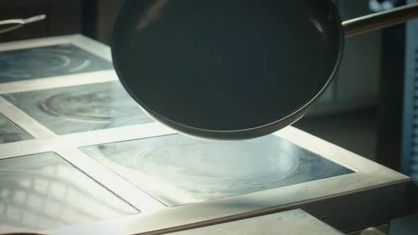 Dressing Oil Onto Frying Pan