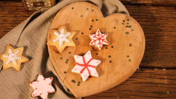 Christmas gingerbread cookies on wooden table