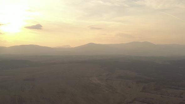 Silhouettes of mountains Deli Jovan and Stol before sunset 4K aerial video