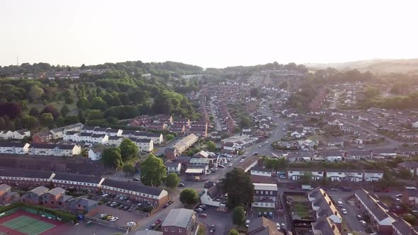 Aerial view of busy Exeter cityscape in Devon, England, during bright sunset