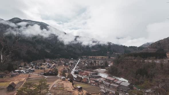 Time lapse of Traditional cottage houses in Shirakawago village with mountain hills