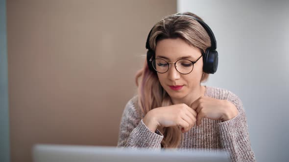 Woman Wearing Headphones Talking Online Video Call Use Laptop