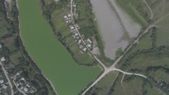 Aerial view of a village and lake