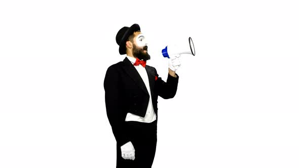 Funny Man Mime Uses Speaker on White Background