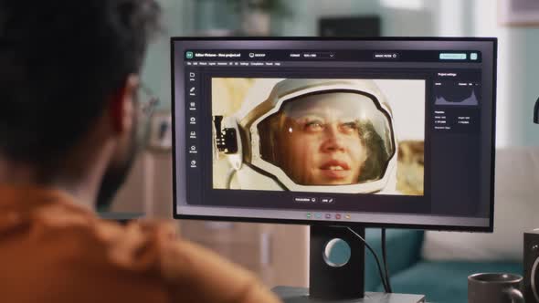 Anonymous Man Retouching Astronaut Photo