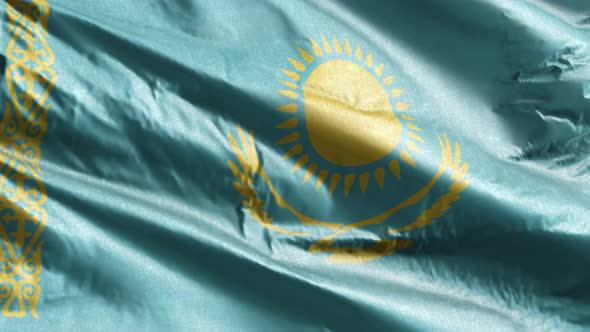 Kazakhstan textile flag waving on the wind loop.