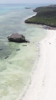 Tanzania  Vertical Video House on Stilts in the Ocean on the Coast of Zanzibar Slow Motion