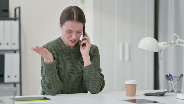 Young Woman Angry on Smartphone 