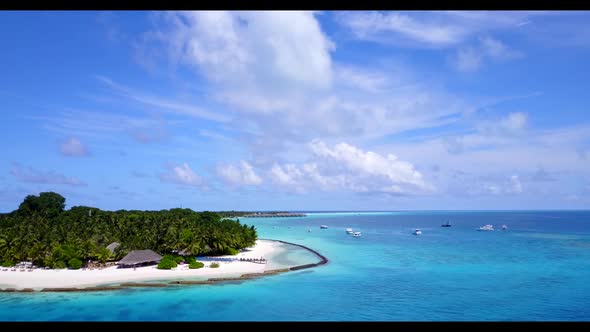 Aerial top down sky of idyllic bay beach trip by clear sea and white sandy background of a dayout in