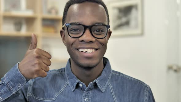 Thumbs Up by Afro-American Man