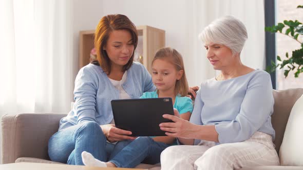 Mother, Daughter and Grandmother with Tablet Pc 39