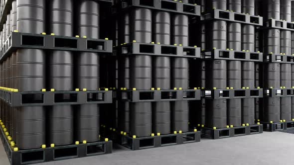 Rows Of Black Metal Oil Barrels In Warehouse