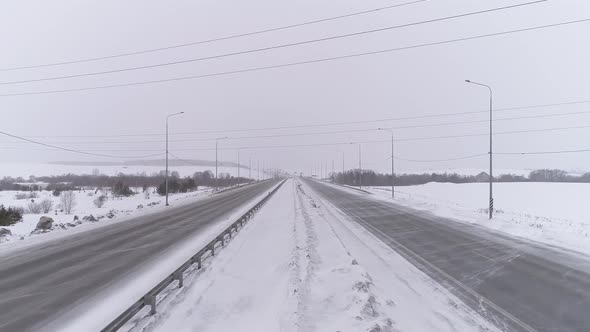 Drone view of empty winter highway 04