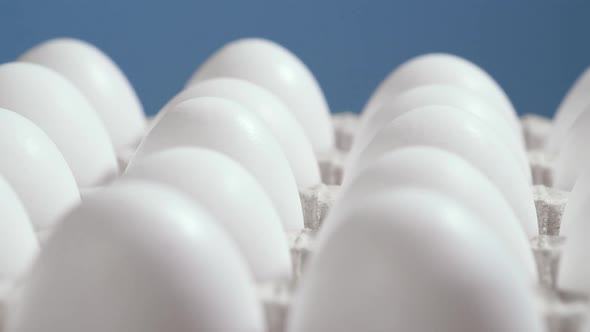 Eggs in a Cardboard Box Rotation Shot Chicken White Fresh Raw Eggs in an Egg Container