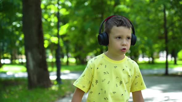 Boy listening to music with headphones