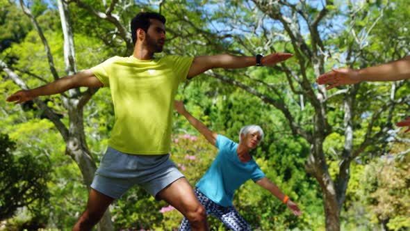 Group of people exercising in the park 4k