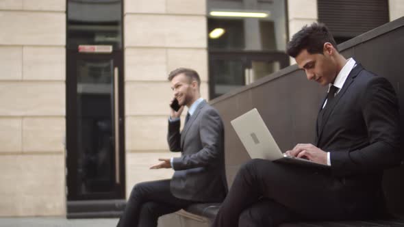 Two Businessmen Outdoors