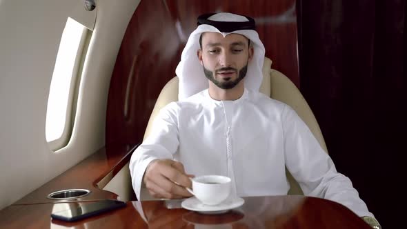 Arabian man flying on his Private jet to dubai.